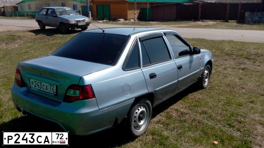 Фото автомобиля DAEWOO NEXIA, 2013 — госномер О458ХР72. Цвет: СЕРО-ПЕРЛАМУТРОВЫЙ