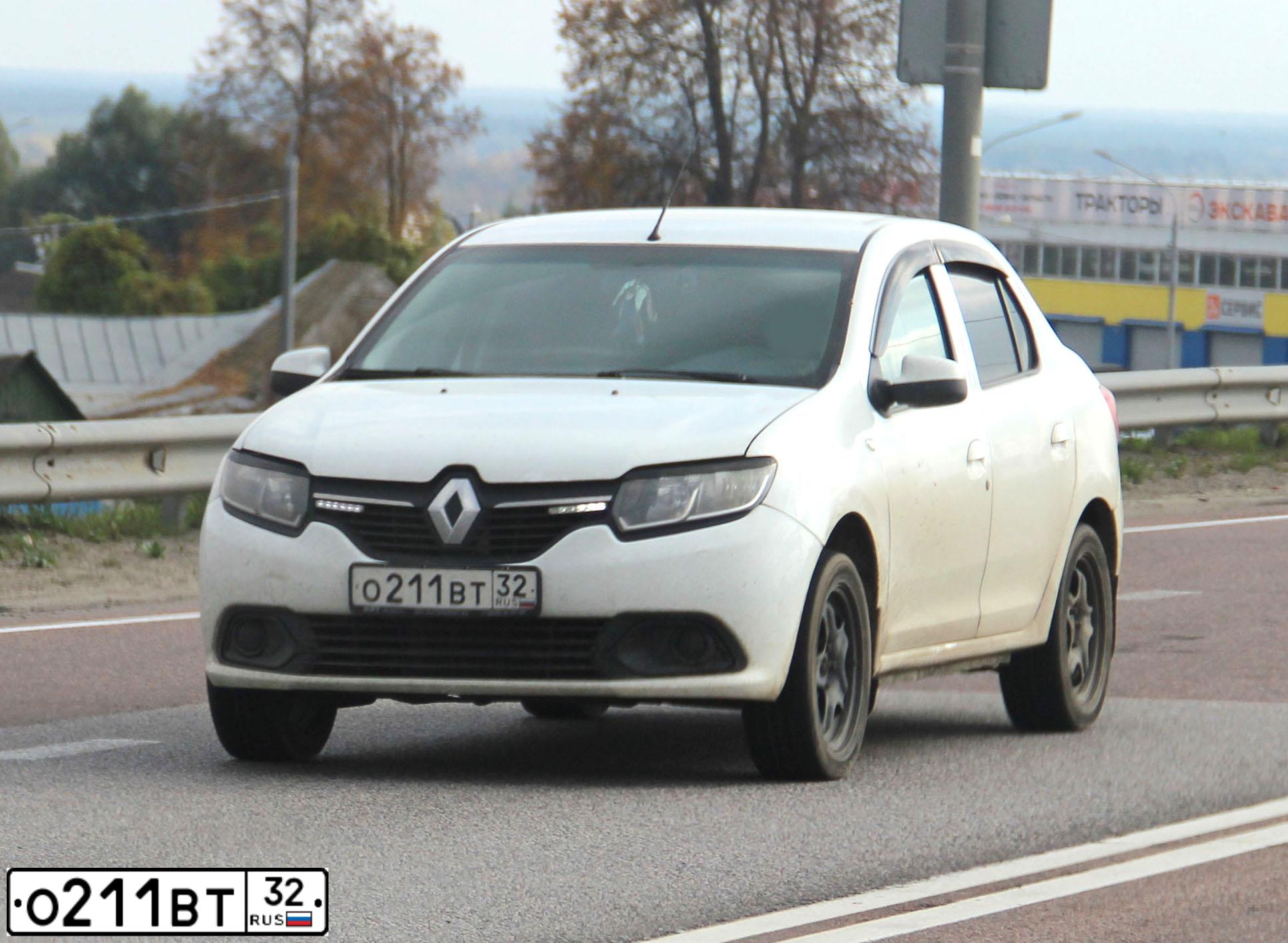 Фото автомобиля RENAULT LOGAN, 2014 — госномер О211ВТ32. Цвет: Белый