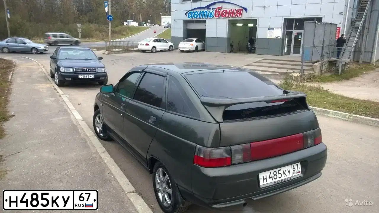 Фото автомобиля LADA 2112 LADA, 2006 — госномер Н485КУ67. Цвет: Темно-зеленый
