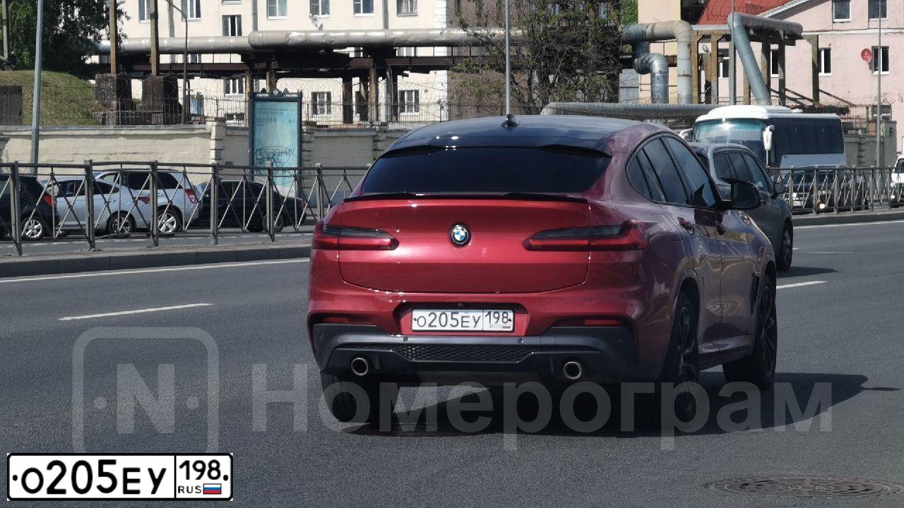 Фото автомобиля BMW X4, 2020 — госномер О205ЕУ198. Цвет: КРАСНЫЙ