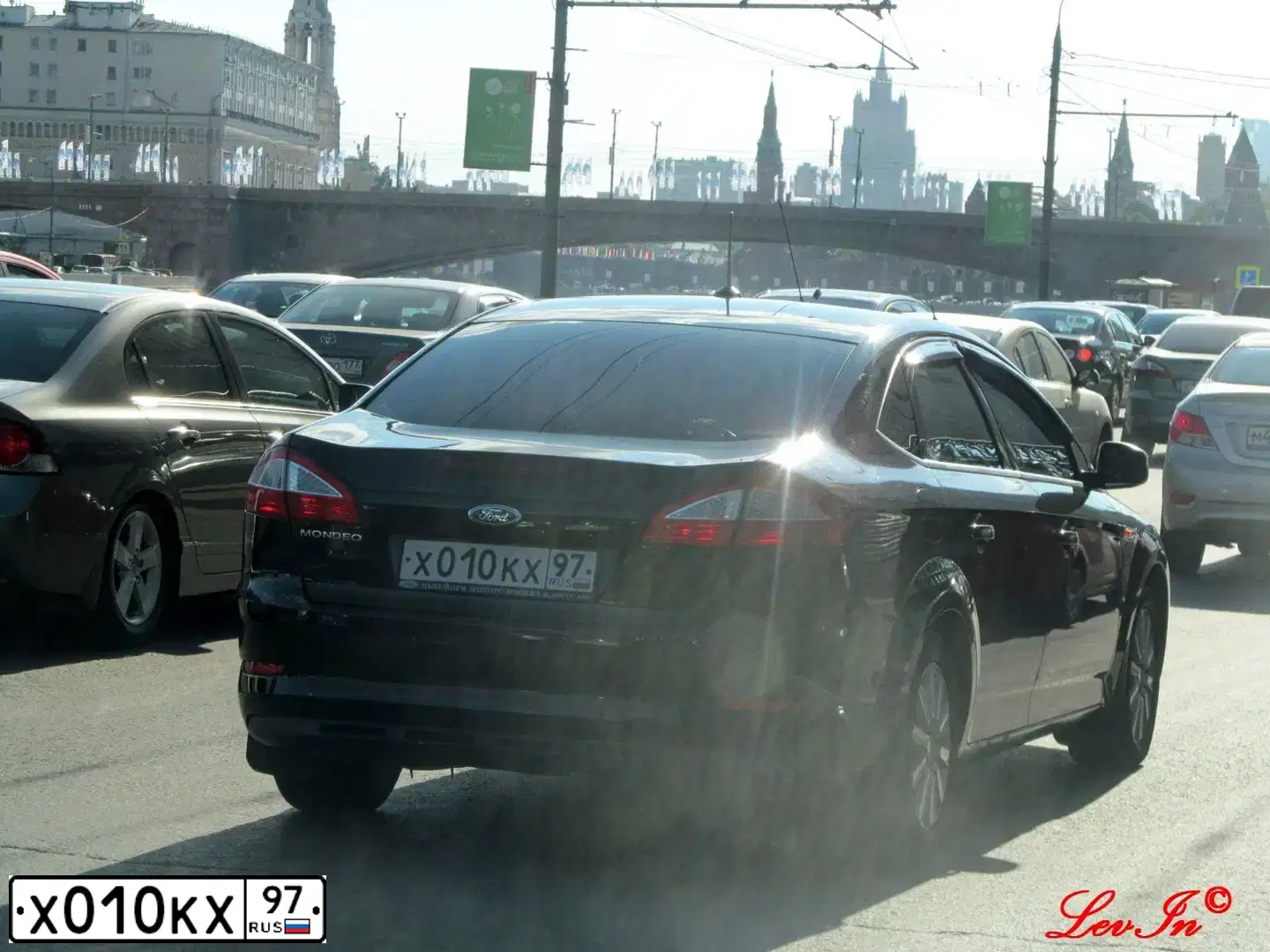 Фото автомобиля PORSCHE CAYENNE, 2004 — госномер Х010КХ97. Цвет: ЧЕРНЫЙ