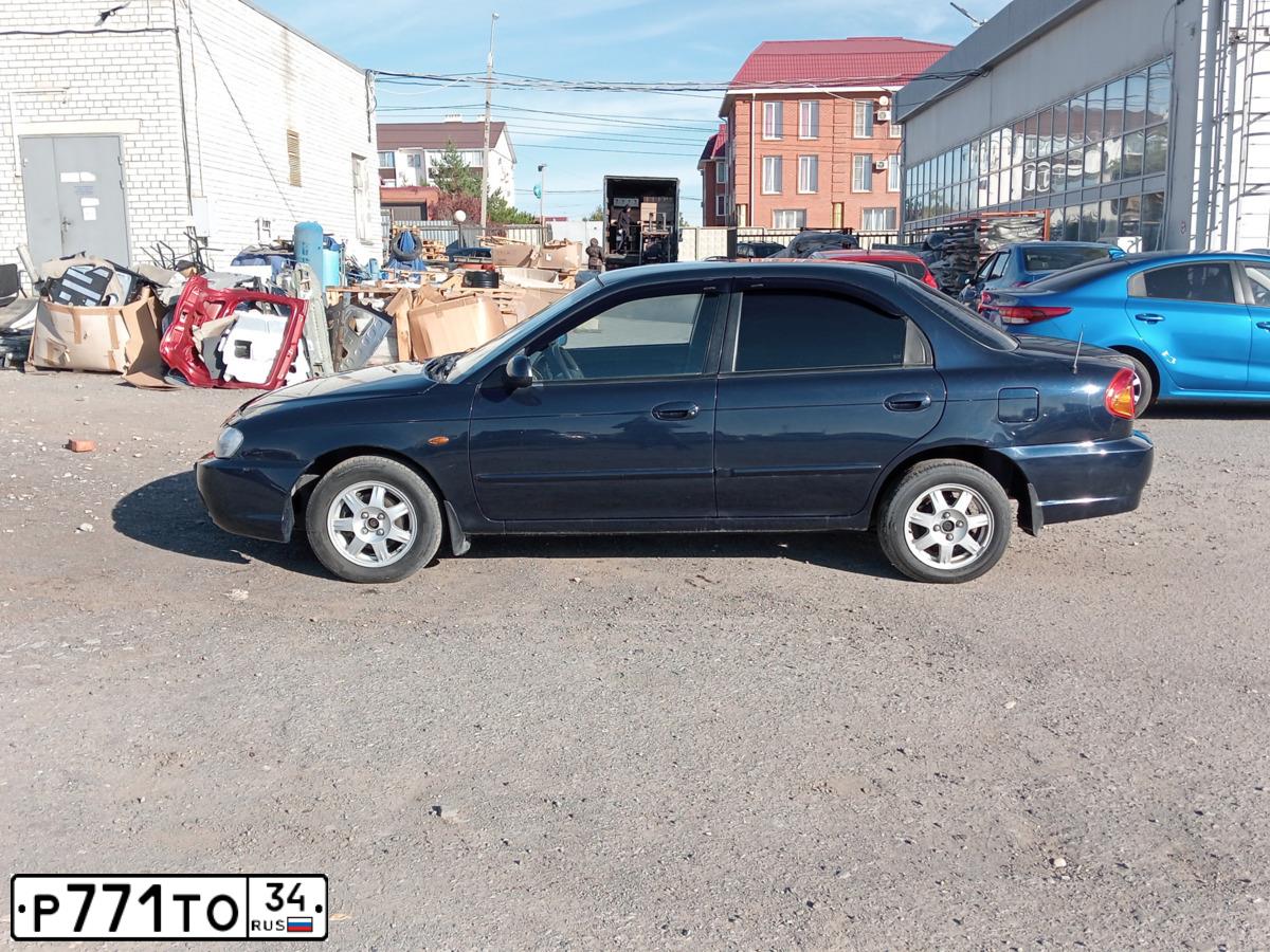 Фото автомобиля KIA SPECTRA, 2008 — госномер А393УР30. Цвет: ТЕМНО СИНИЙ