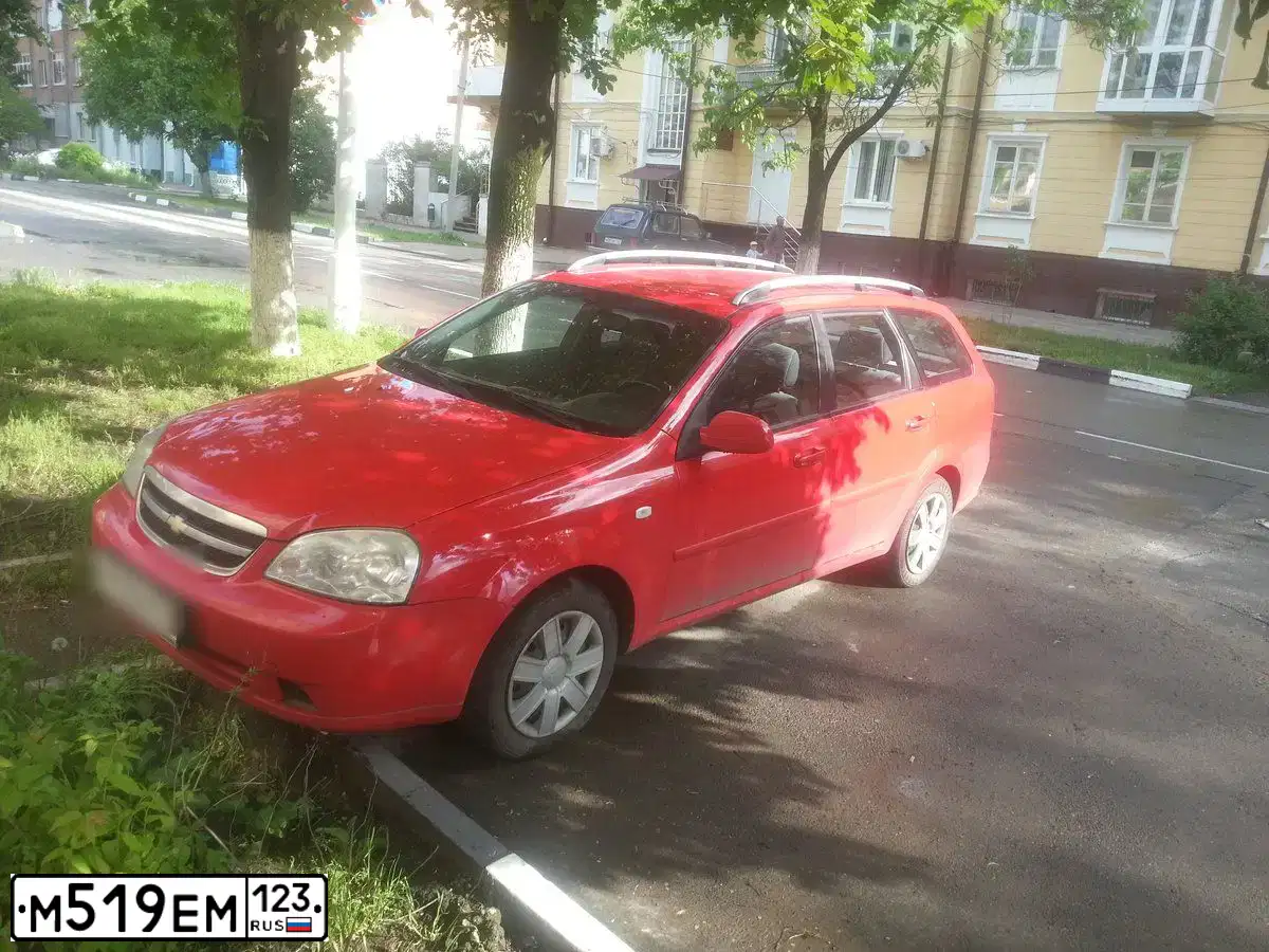 Фото автомобиля CHEVROLET LACETTI, 2008. Цвет: Красный