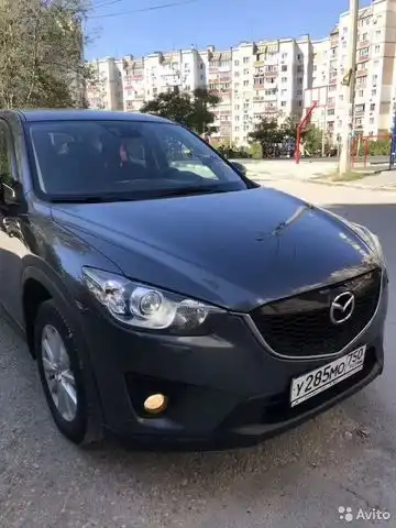 Фото автомобиля MAZDA CX-5, 2012 — госномер В552МА92. Цвет: Серый