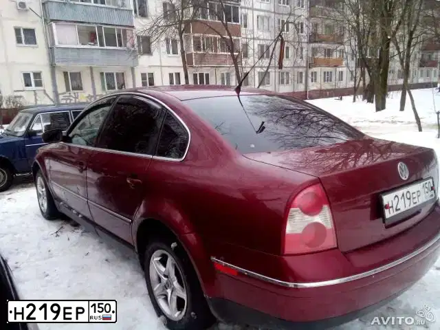 Фото автомобиля VOLKSWAGEN PASSAT, 2002 — госномер Е854ОТ777. Цвет: ВИШНЕВЫЙ