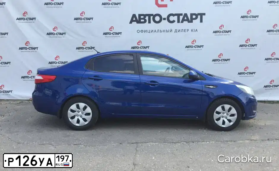 Фото автомобиля KIA RIO, 2012 — госномер Т978ВХ31. Цвет: СИНИЙ