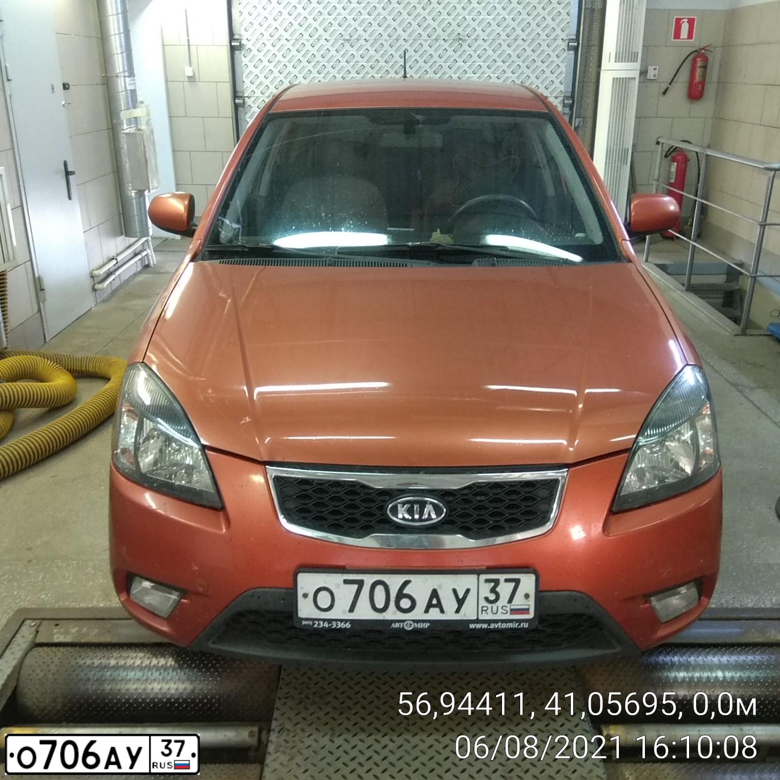 Фото автомобиля KIA RIO, 2009 — госномер О706АУ37. Цвет: ОРАНЖЕВЫЙ