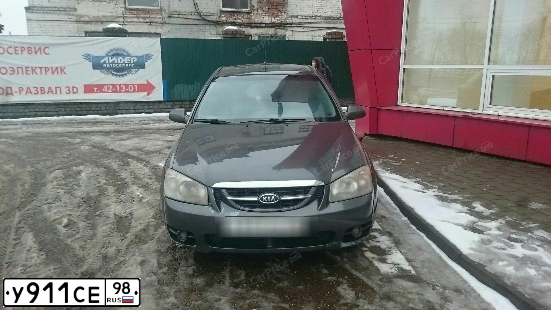 Фото автомобиля KIA CERATO, 2006 — госномер У911СЕ98. Цвет: СЕРО-КОРИЧНЕВЫЙ