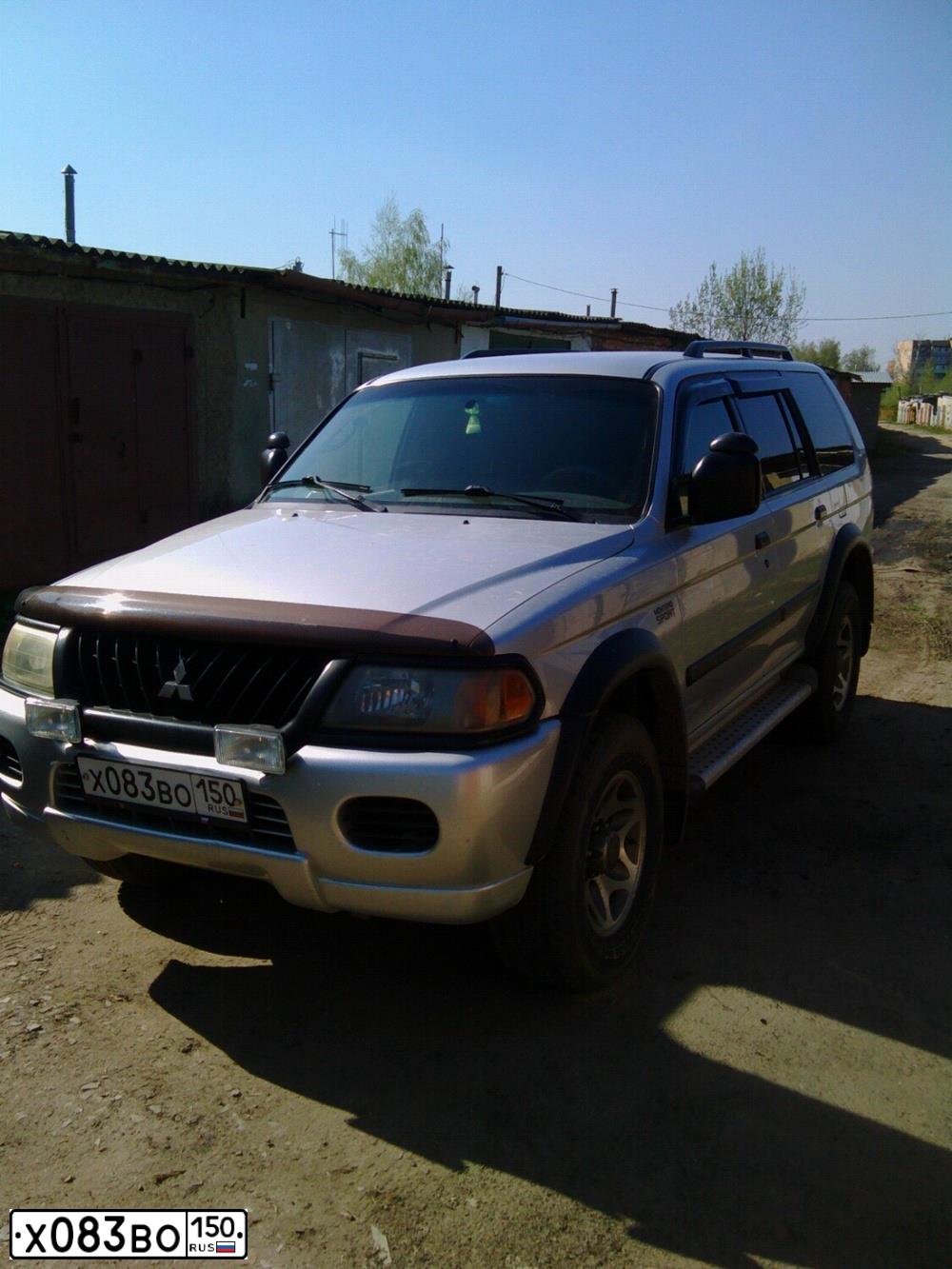Фото автомобиля MITSUBISHI MONTERO, 2002 — госномер Т516ОН31. Цвет: СЕРЕБРИСТЫЙ