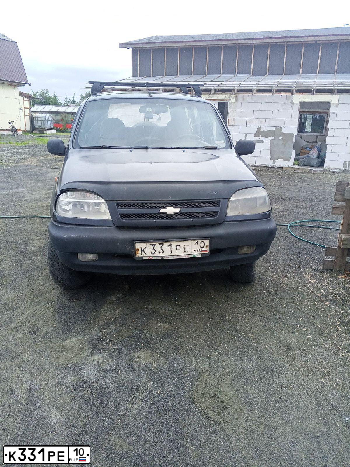 Фото автомобиля CHEVROLET NIVA, 2006 — госномер К331РЕ10. Цвет: ЧЕРНО-СИНИЙ МЕТАЛЛИК