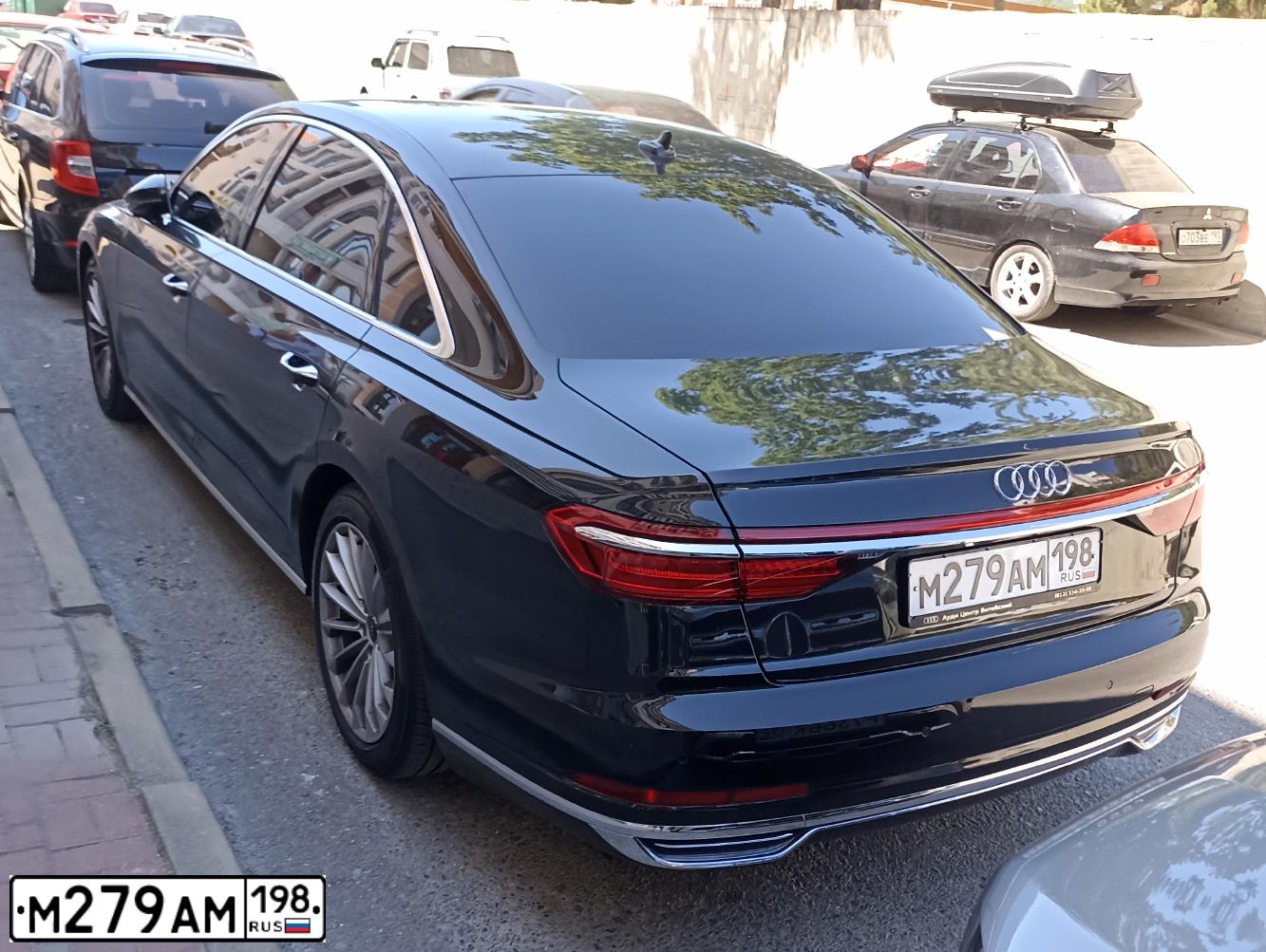 Фото автомобиля AUDI A8L, 2021 — госномер М279АМ198. Цвет: ЧЕРНЫЙ