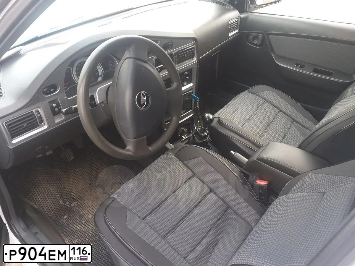 Фото автомобиля DAEWOO NEXIA, 2012 — госномер М769ХО716. Цвет: БЕЛО-ДЫМЧАТЫЙ