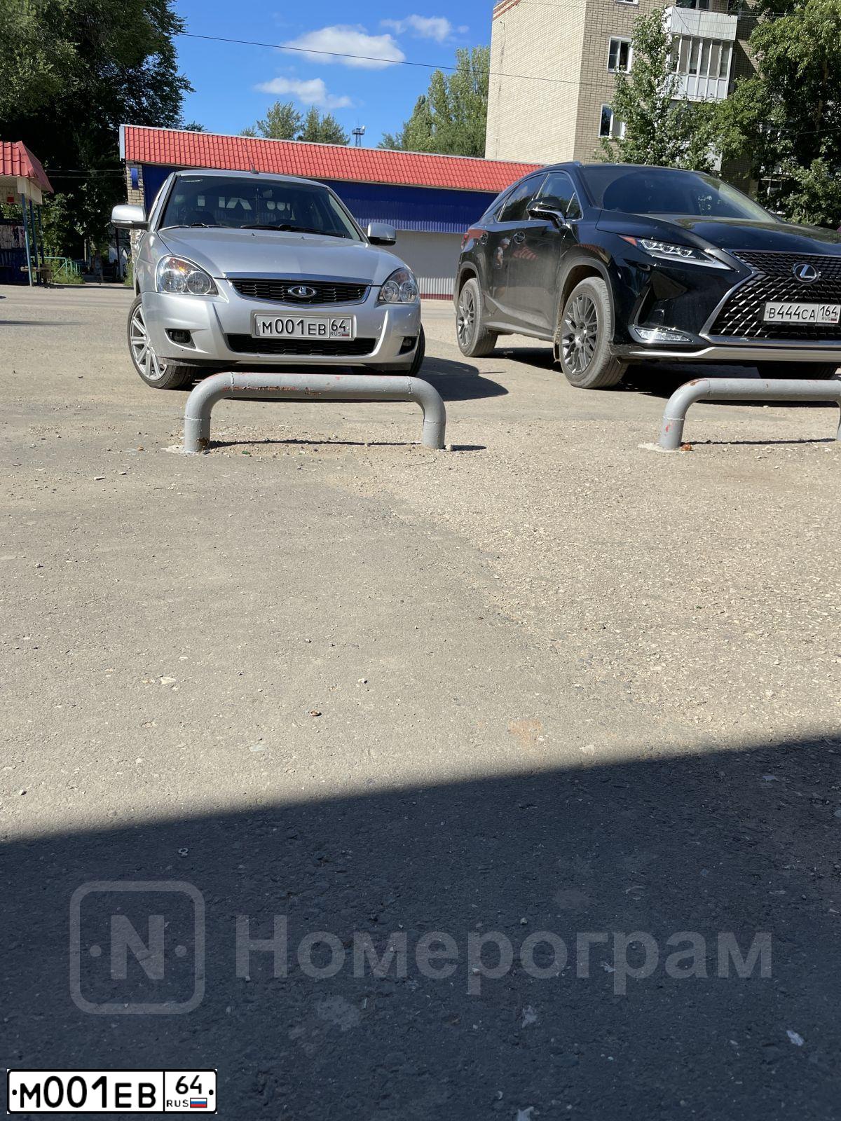Фото автомобиля LADA 2110, 2004 — госномер М001ЕВ64. Цвет: СЕРО ЗЕЛЕНЫЙ