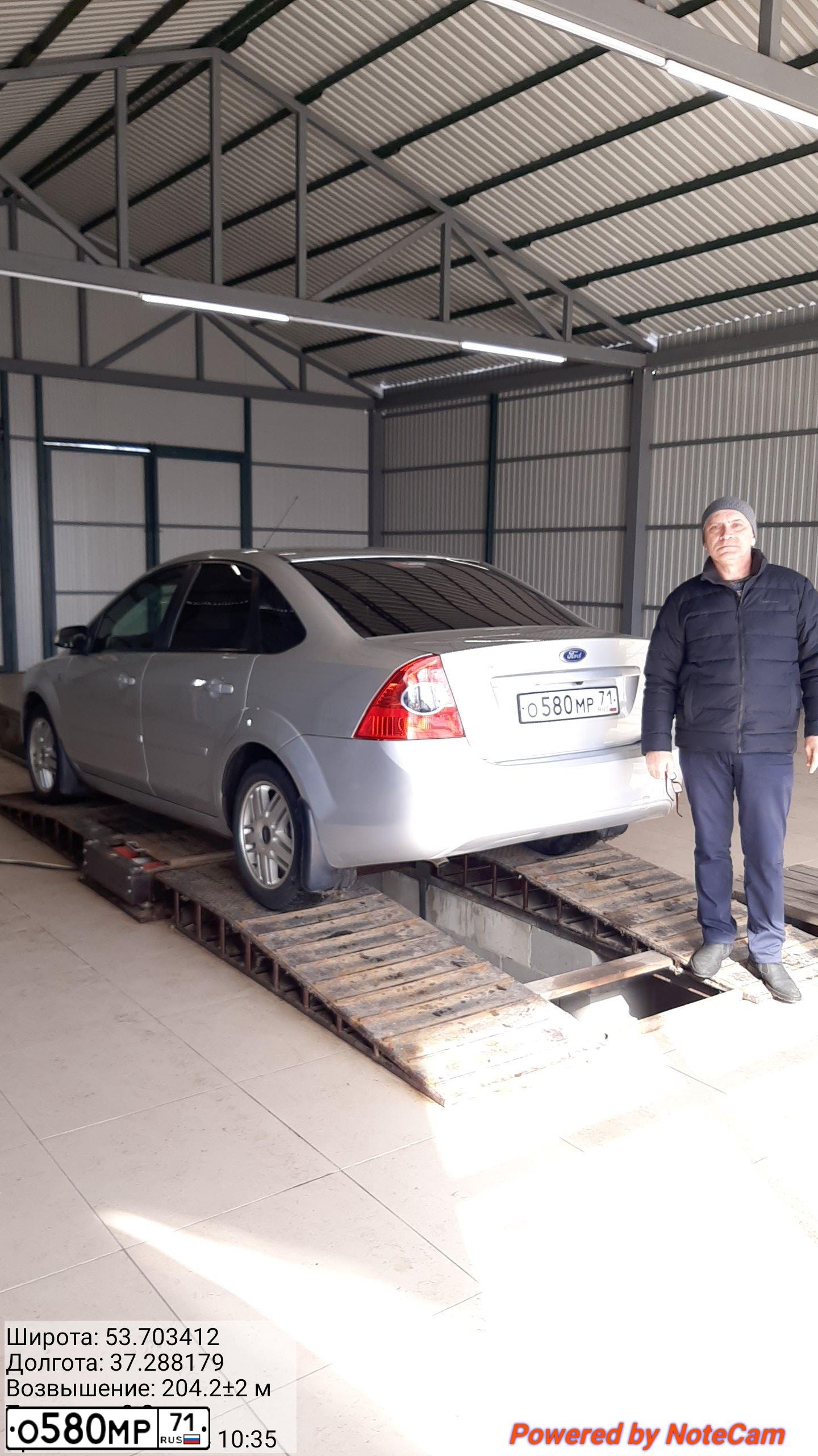 Фото автомобиля FORD FOCUS, 2006 — госномер О580МР71. Цвет: Серебристый