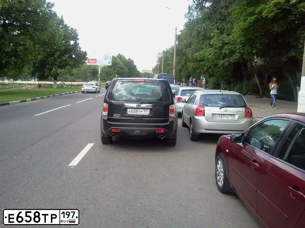 Фото автомобиля HONDA PILOT, 2012 — госномер Е658ТР197. Цвет: ЧЕРНЫЙ