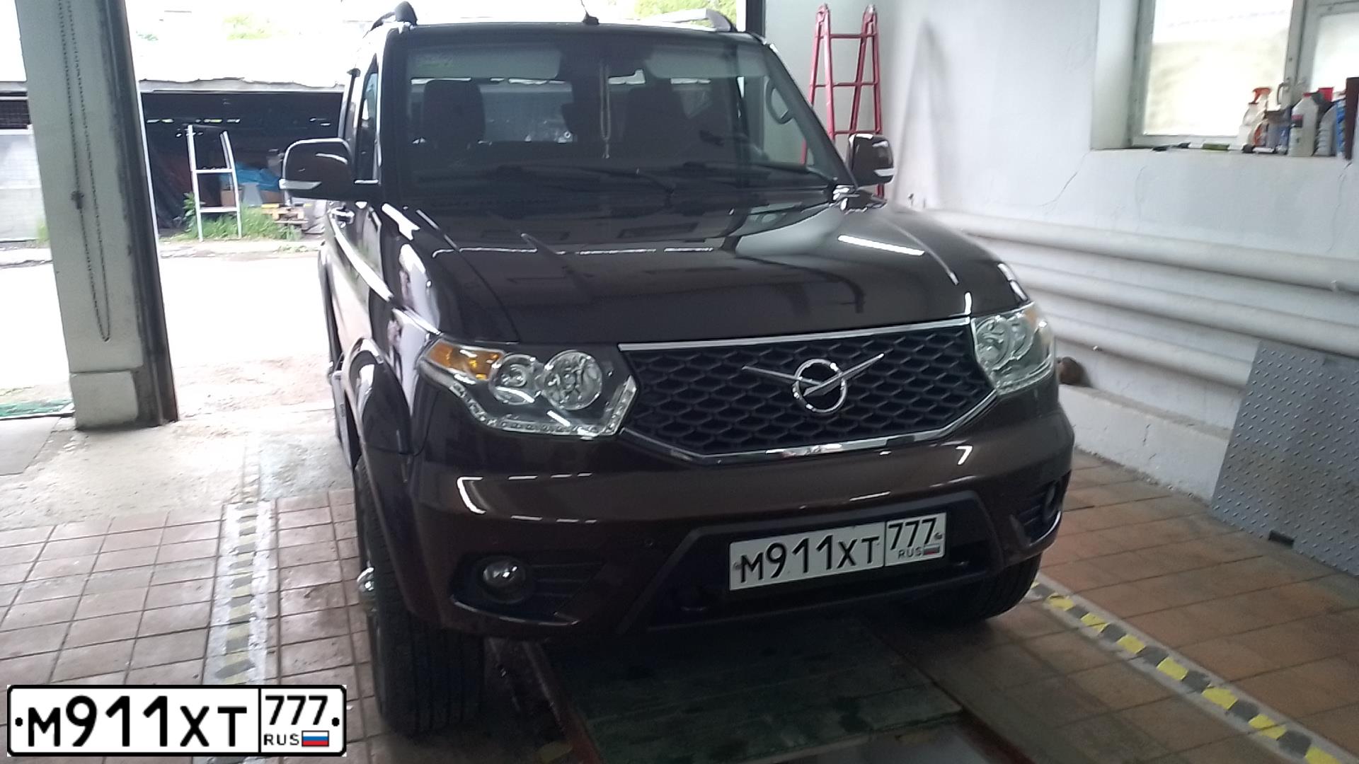 Фото автомобиля UAZ 3163 PATRIOT, 2017 — госномер М911ХТ777. Цвет: КОРИЧНЕВЫЙ МЕТАЛЛИК