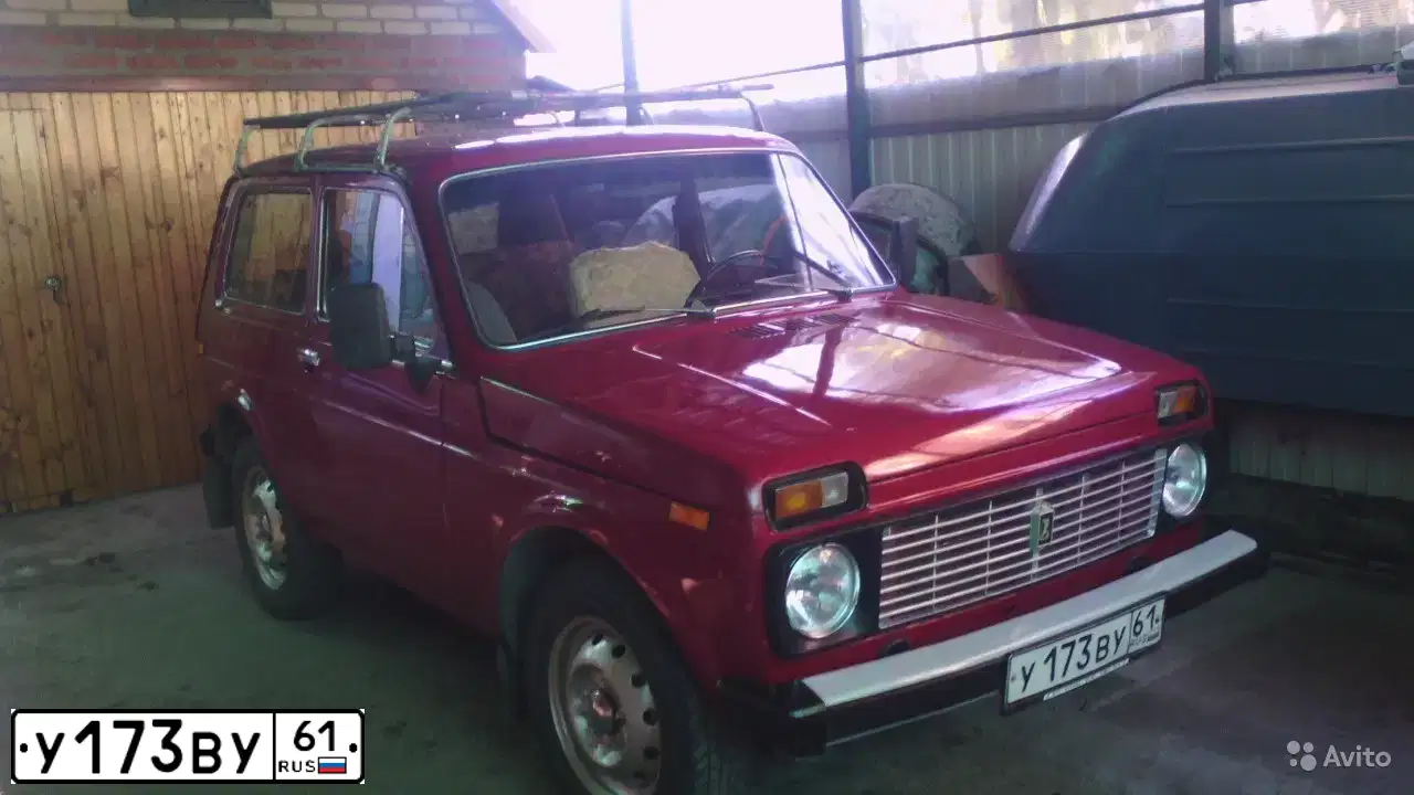 Фото автомобиля VAZ 2121 NIVA, 1990 — госномер У173ВУ61. Цвет: Красный