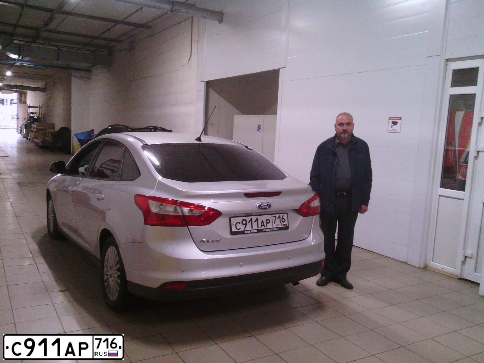 Фото автомобиля FORD FOCUS, 2011 — госномер О151НС116. Цвет: СЕРЕБРИСТЫЙ