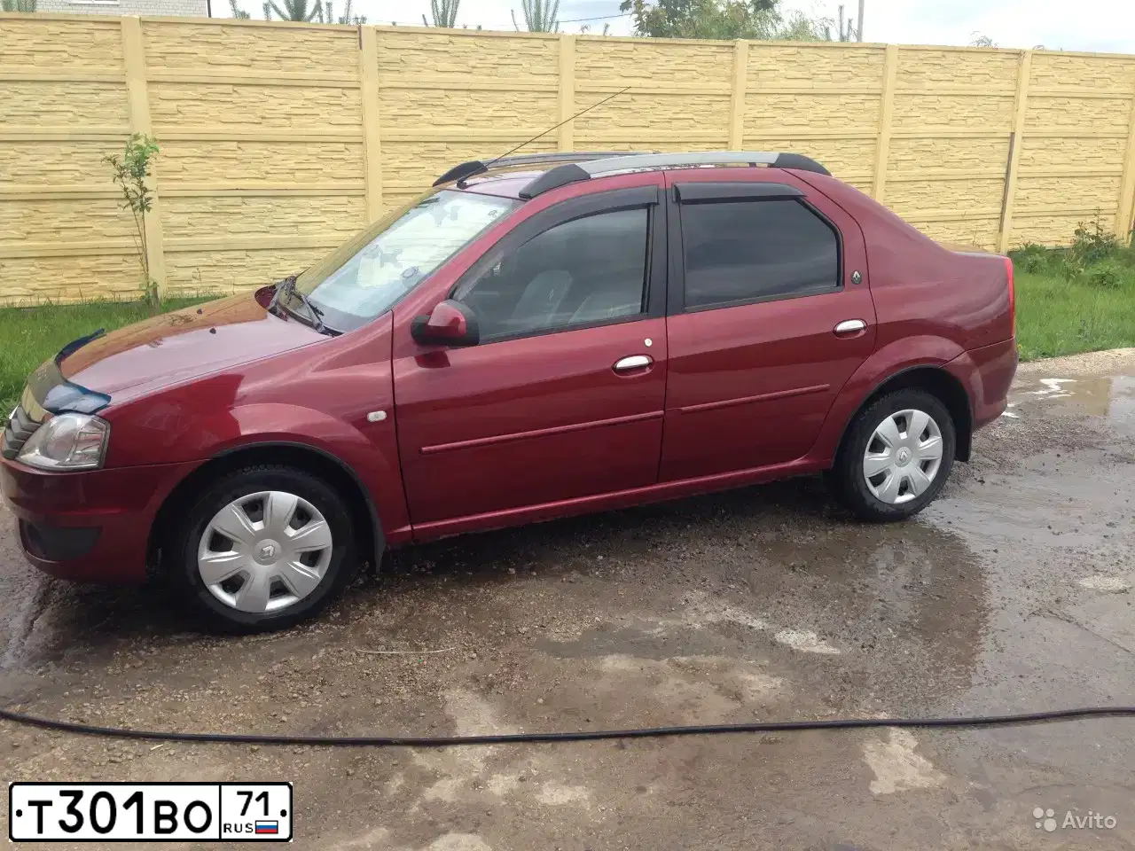 Фото автомобиля RENAULT LOGAN, 2011 — госномер Е900ЕО71. Цвет: КРАСНЫЙ