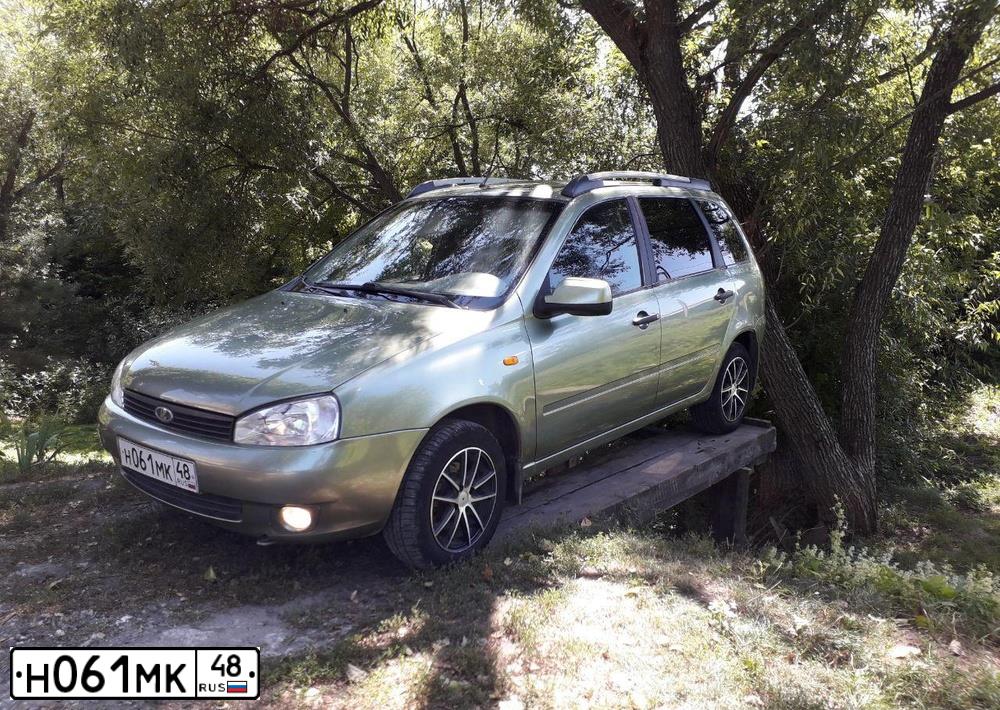 Фото автомобиля LADA KALINA, 2011 — госномер О946СТ68. Цвет: СВЕТЛО-ЗЕЛЕНЫЙ