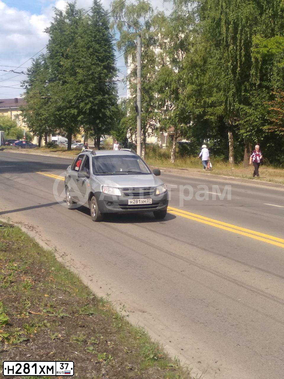 Фото автомобиля LADA 2190 GRANTA, 2012 — госномер Н281ХМ37. Цвет: серебристый