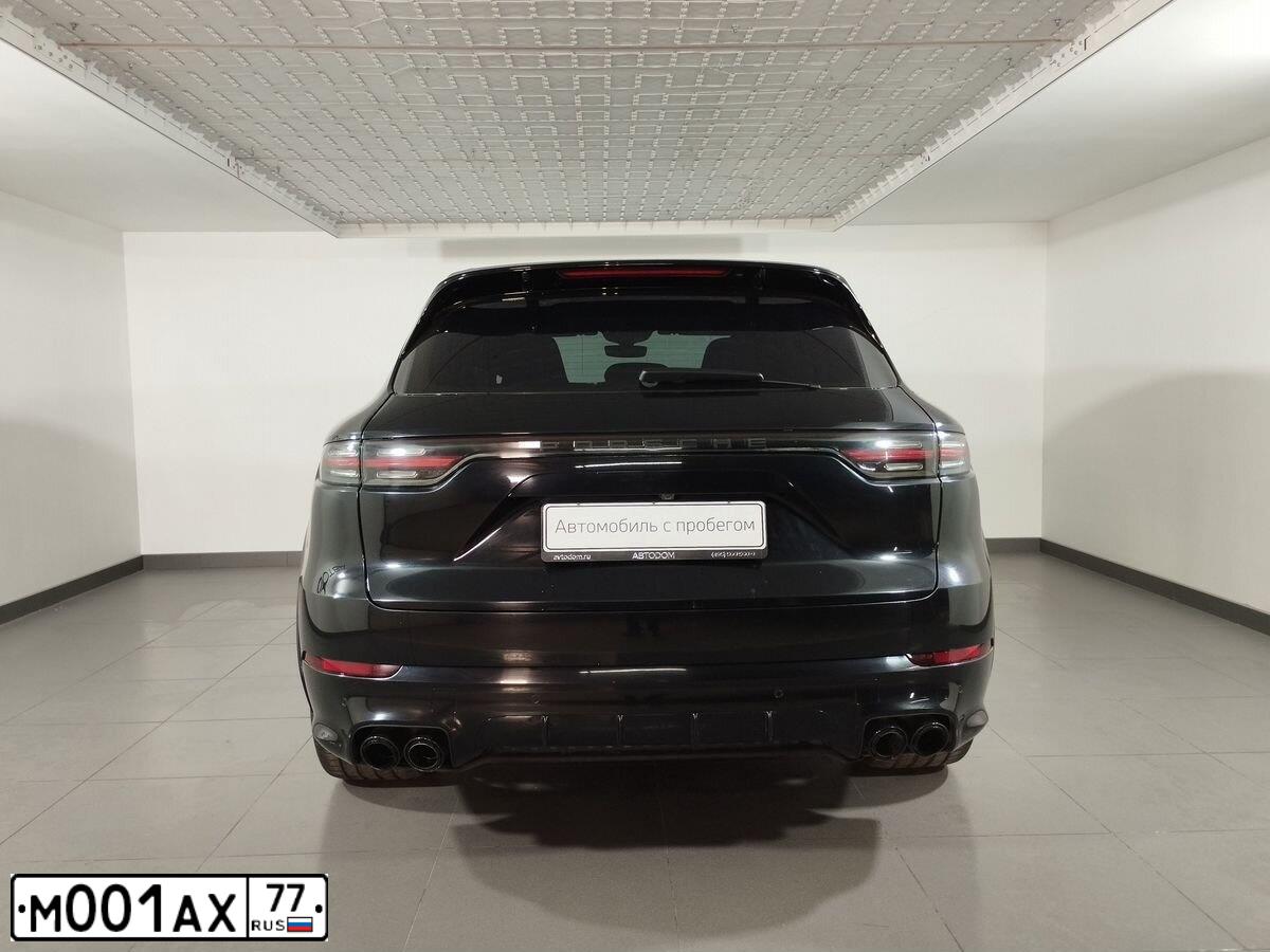 Фото автомобиля ГАЗ 310200, 1994 — госномер М001АХ77. Цвет: ЧЕРНЫЙ