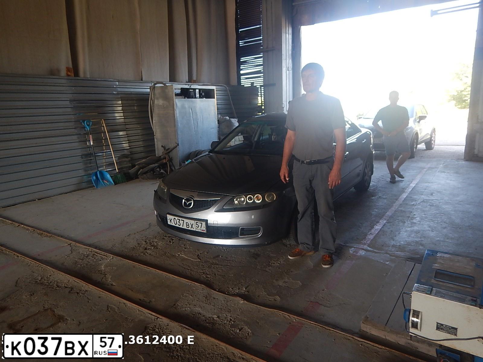 Фото автомобиля MAZDA 6, 2006 — госномер К037ВХ57. Цвет: СЕРЫЙ