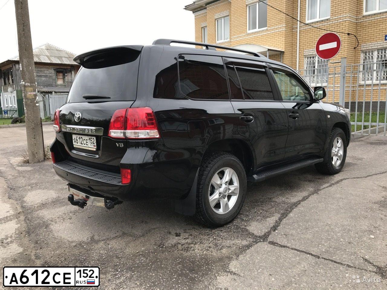 Фото автомобиля TOYOTA LANDCRUISER 200, 2009 — госномер М005МЕ152. Цвет: ЧЕРНЫЙ