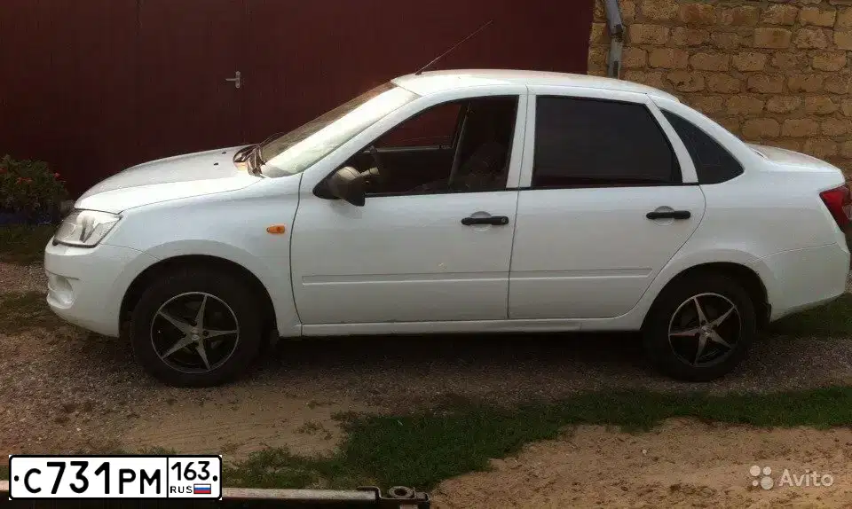 Фото автомобиля LADA 2190 GRANTA, 2013 — госномер С731РМ163. Цвет: Белый