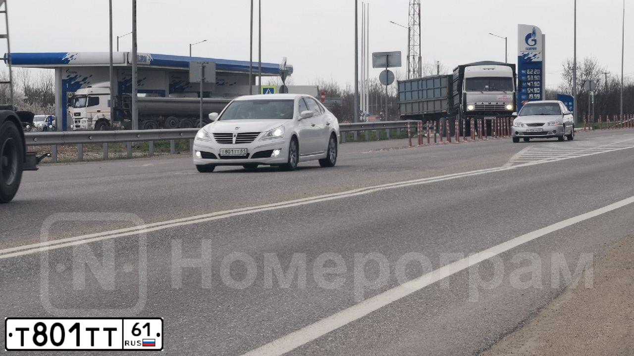 Фото автомобиля VOLKSWAGEN TIGUAN, 2013 — госномер Е851АХ193. Цвет: Белый