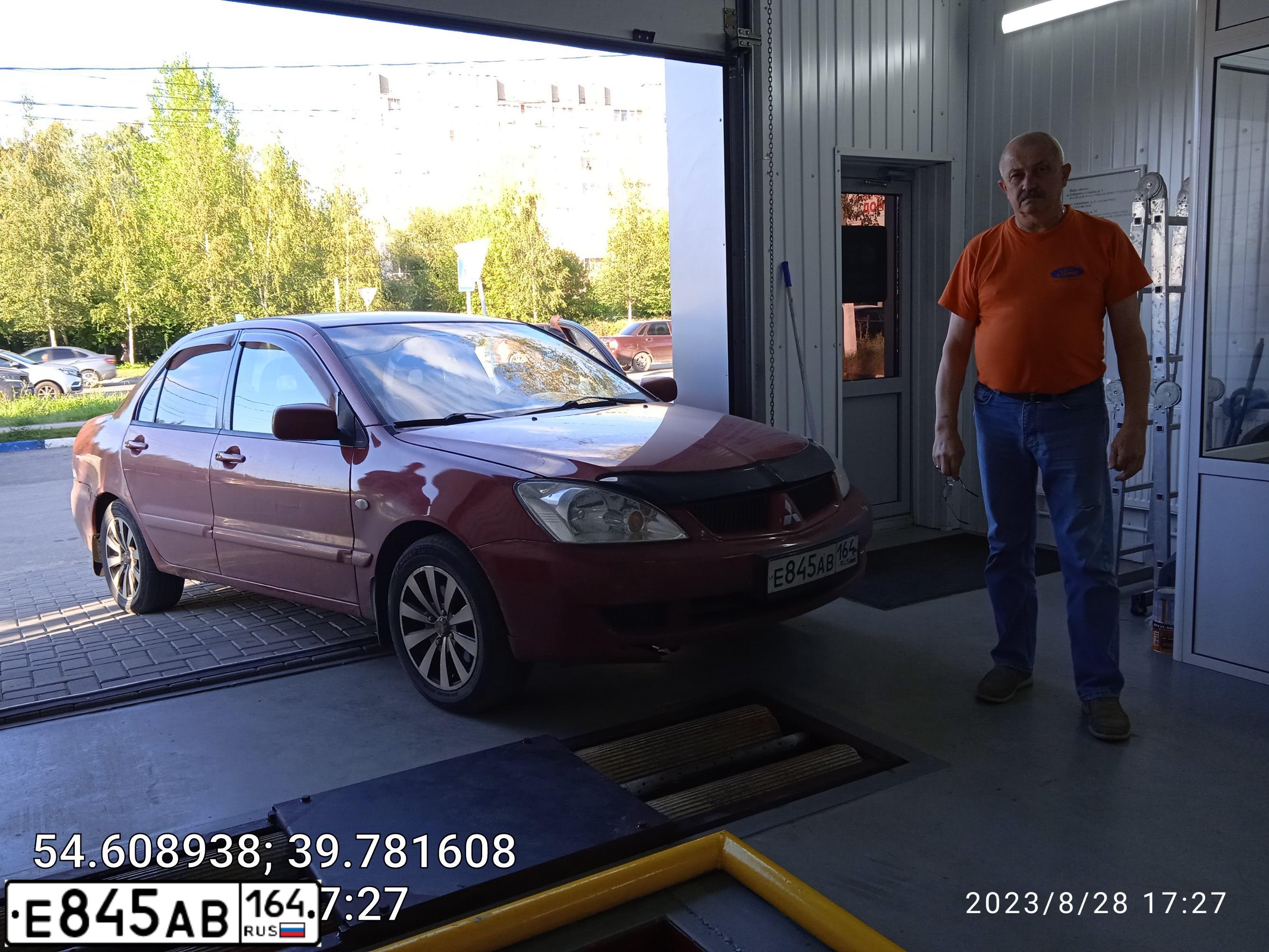 Фото автомобиля MITSUBISHI LANCER, 2006 — госномер Р510КМ62. Цвет: Красный