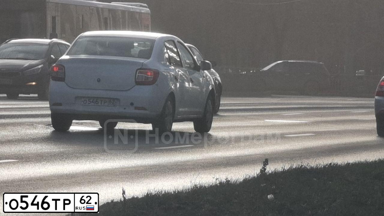Фото автомобиля RENAULT LOGAN, 2014 — госномер О546ТР62. Цвет: Белый