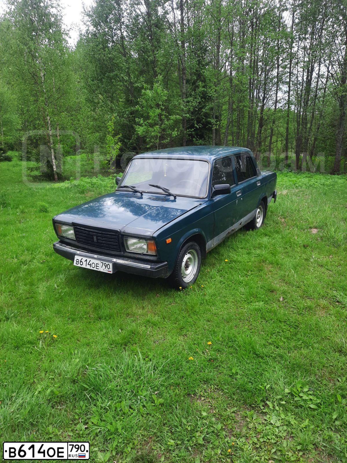 Фото автомобиля ВАЗ 21074 ЛАДА 2107, 2006 — госномер М123АВ250. Цвет: ЧЕРНО-ЗЕЛЕНЫЙ