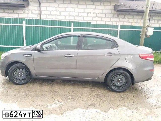 Фото автомобиля KIA RIO, 2016 — госномер У270СЕ71. Цвет: ТЕМНО-СЕРЫЙ