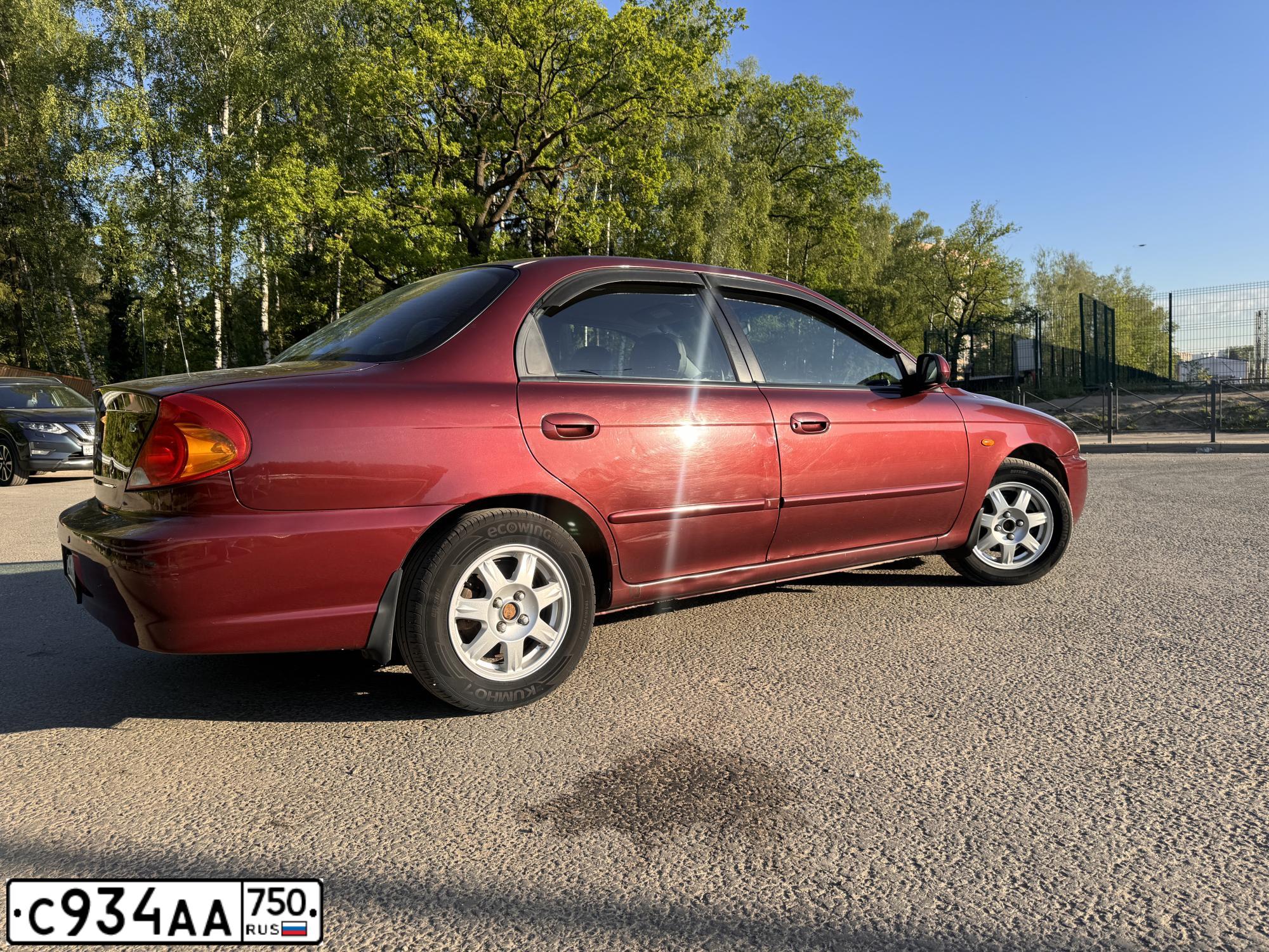 Фото автомобиля KIA SPECTRA, 2009 — госномер С934АА750. Цвет: КРАСНЫЙ