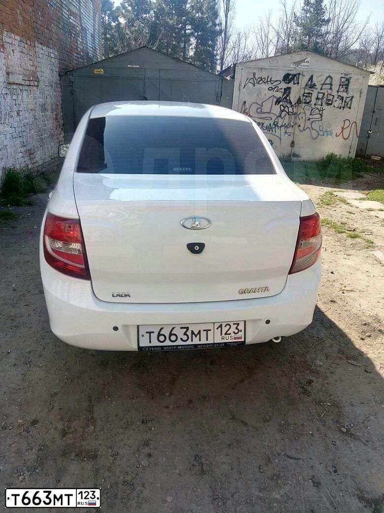 Фото автомобиля LADA 2190 GRANTA, 2013 — госномер В040КЕ01. Цвет: Белый