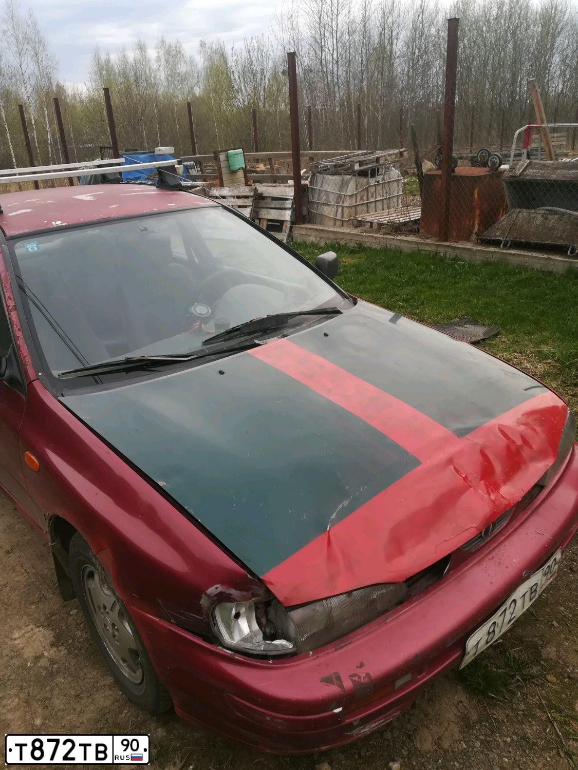 Фото автомобиля SUBARU IMPREZA, 1995 — госномер В200РМ90. Цвет: ВИШНЕВЫЙ