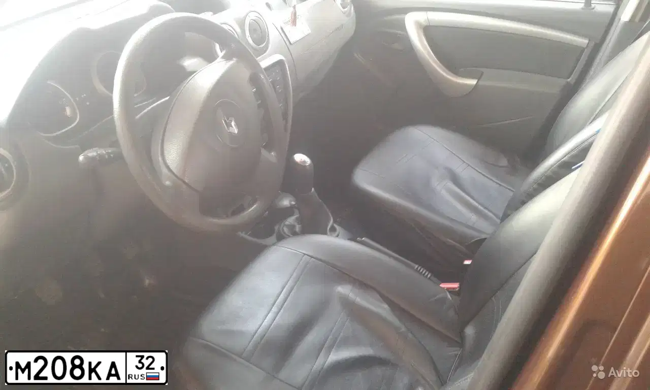 Фото автомобиля RENAULT DUSTER, 2012 — госномер М208КА32. Цвет: Коричневый