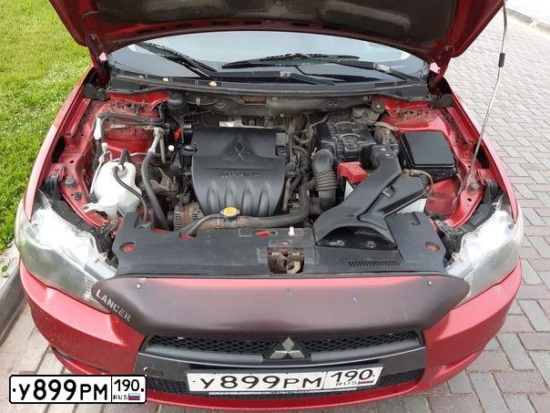 Фото автомобиля MITSUBISHI LANCER, 2007 — госномер Н373ОХ134. Цвет: Красный