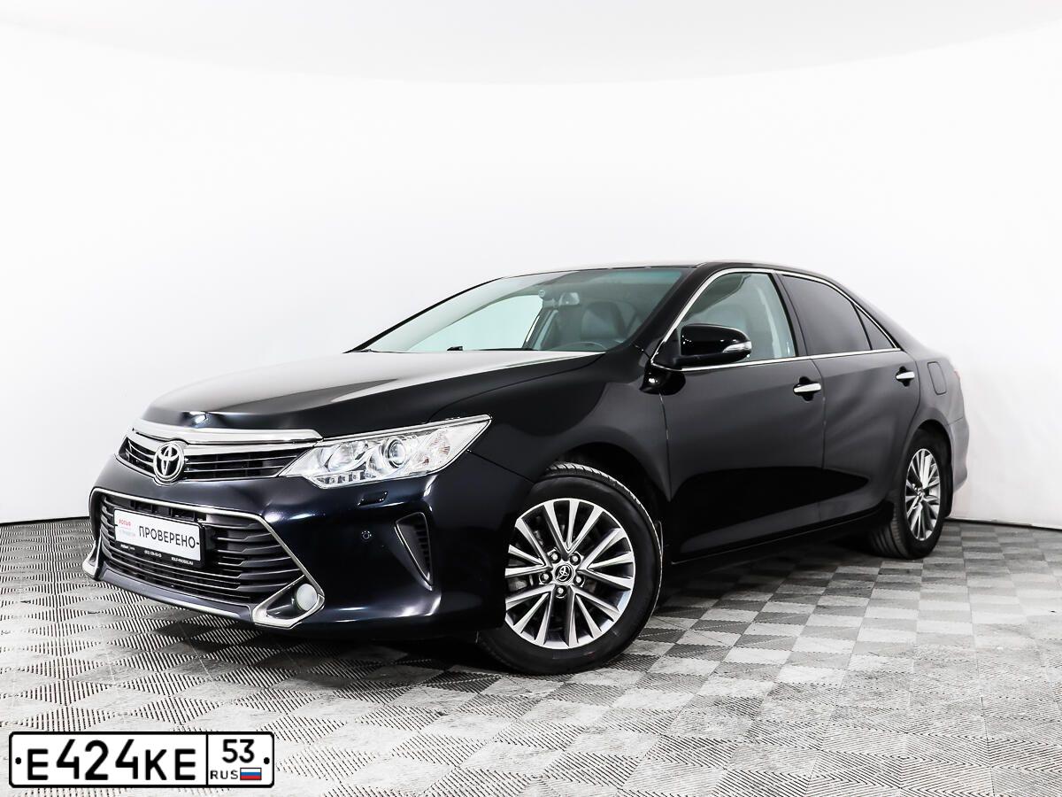Фото автомобиля TOYOTA CAMRY, 2016 — госномер Е329РА53. Цвет: ЧЕРНЫЙ МЕТАЛЛИК