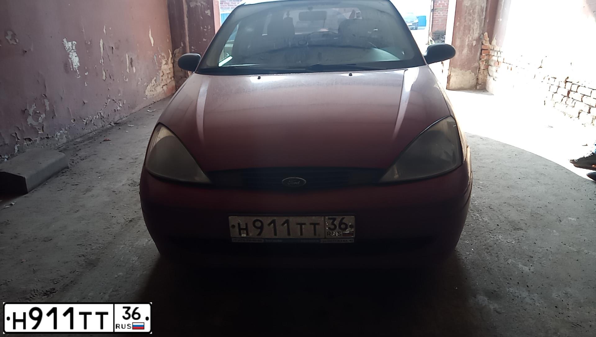 Фото автомобиля FORD D FOCUS, 2000 — госномер Н911ТТ36. Цвет: ВИШНЕВЫЙ