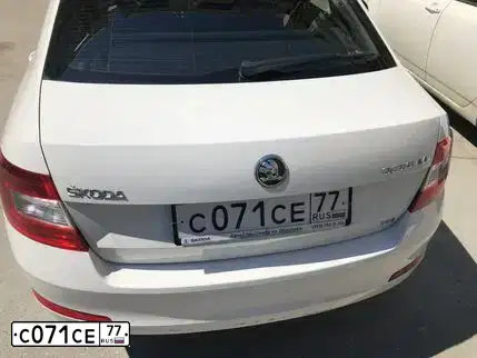 Фото автомобиля SKODA OCTAVIA, 2013 — госномер О335РМ154. Цвет: Белый