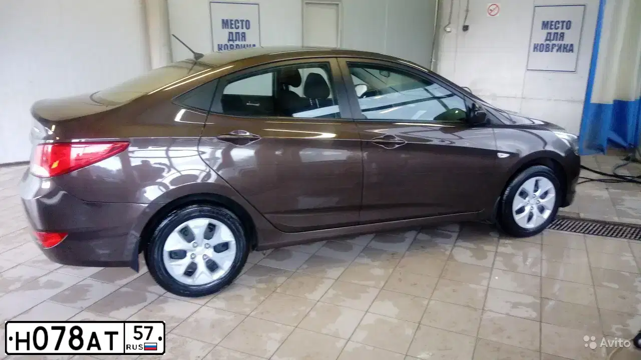 Фото автомобиля HYUNDAI SOLARIS, 2015 — госномер С785ХР161. Цвет: Коричневый