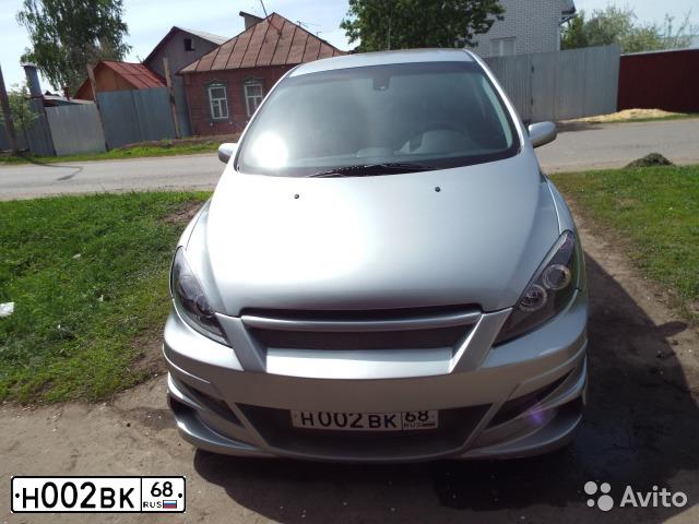 Фото автомобиля PEUGEOT 3008, 2011 — госномер Х425ЕО31. Цвет: Темно-синий