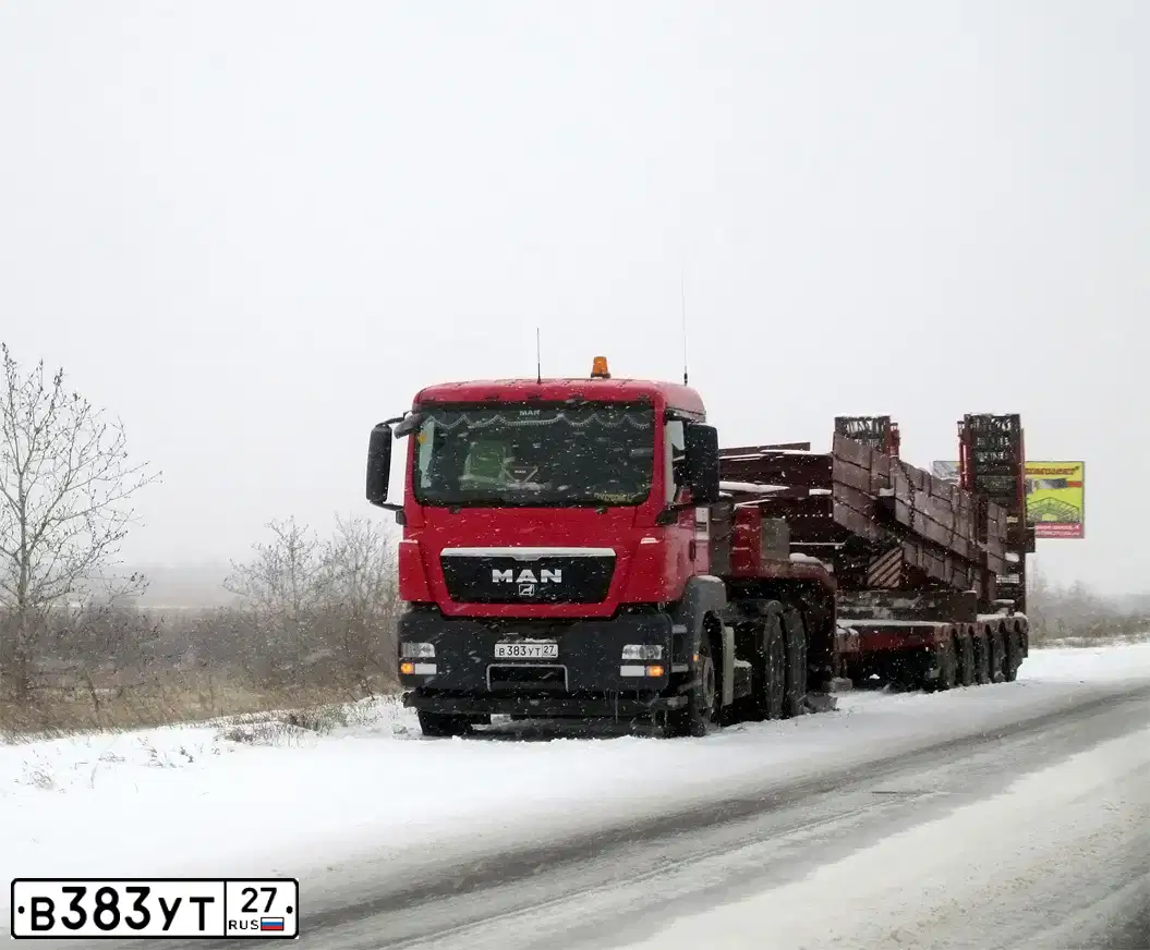 Фото автомобиля MAN TGS 26/33.XXX /6X4/, 2012 — госномер В383УТ27. Цвет: КРАСНЫЙ