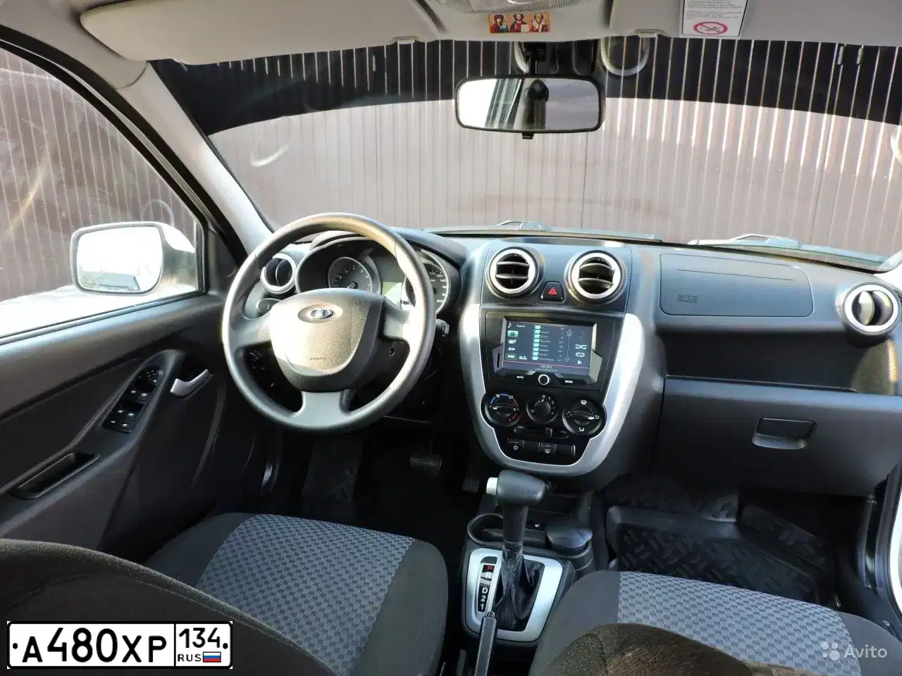 Фото автомобиля LADA 2190 GRANTA, 2013 — госномер Р031НА05. Цвет: Белый