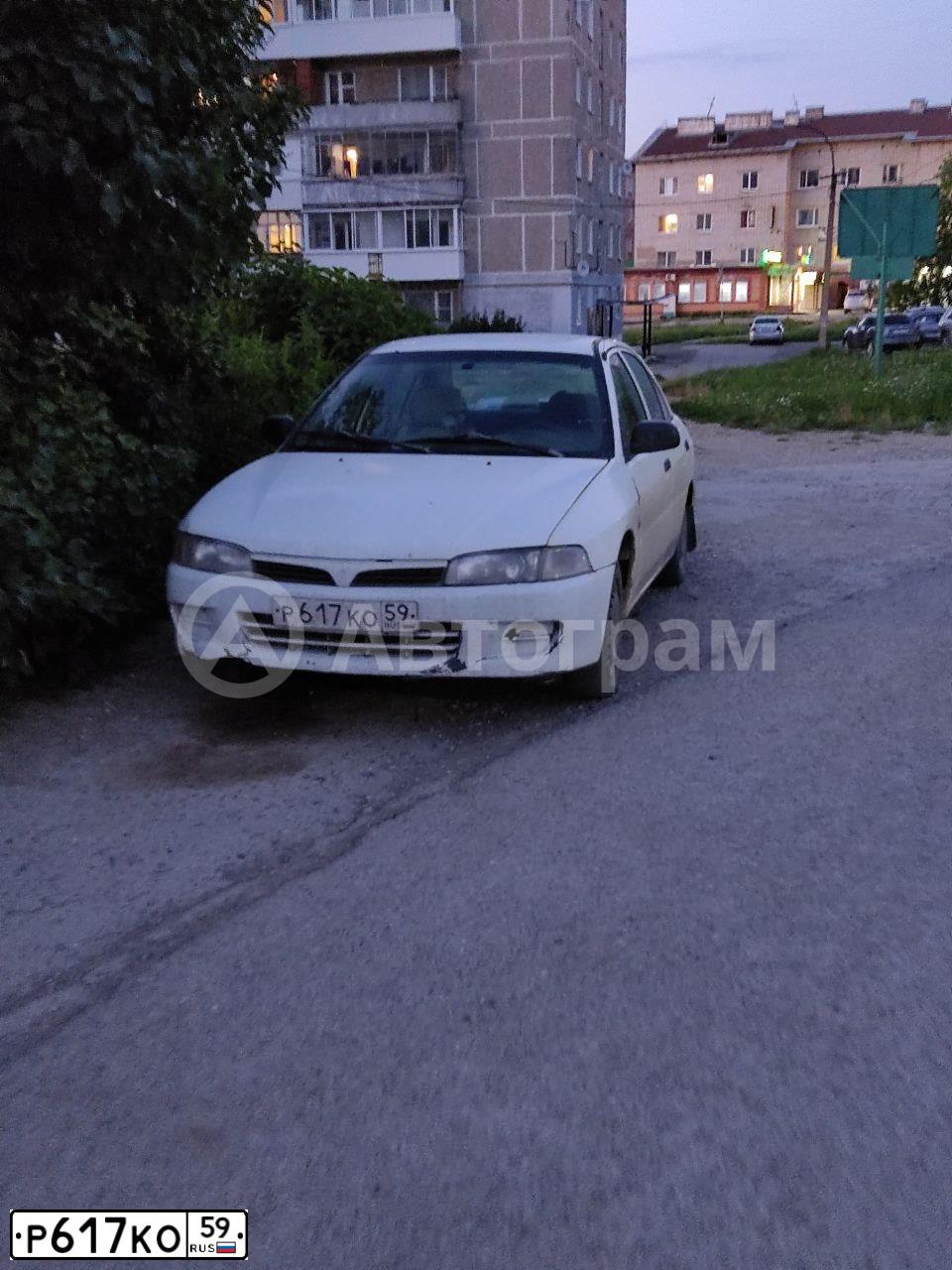 Фото автомобиля MITSUBISHI LANCER, 1997 — госномер Р617КО59