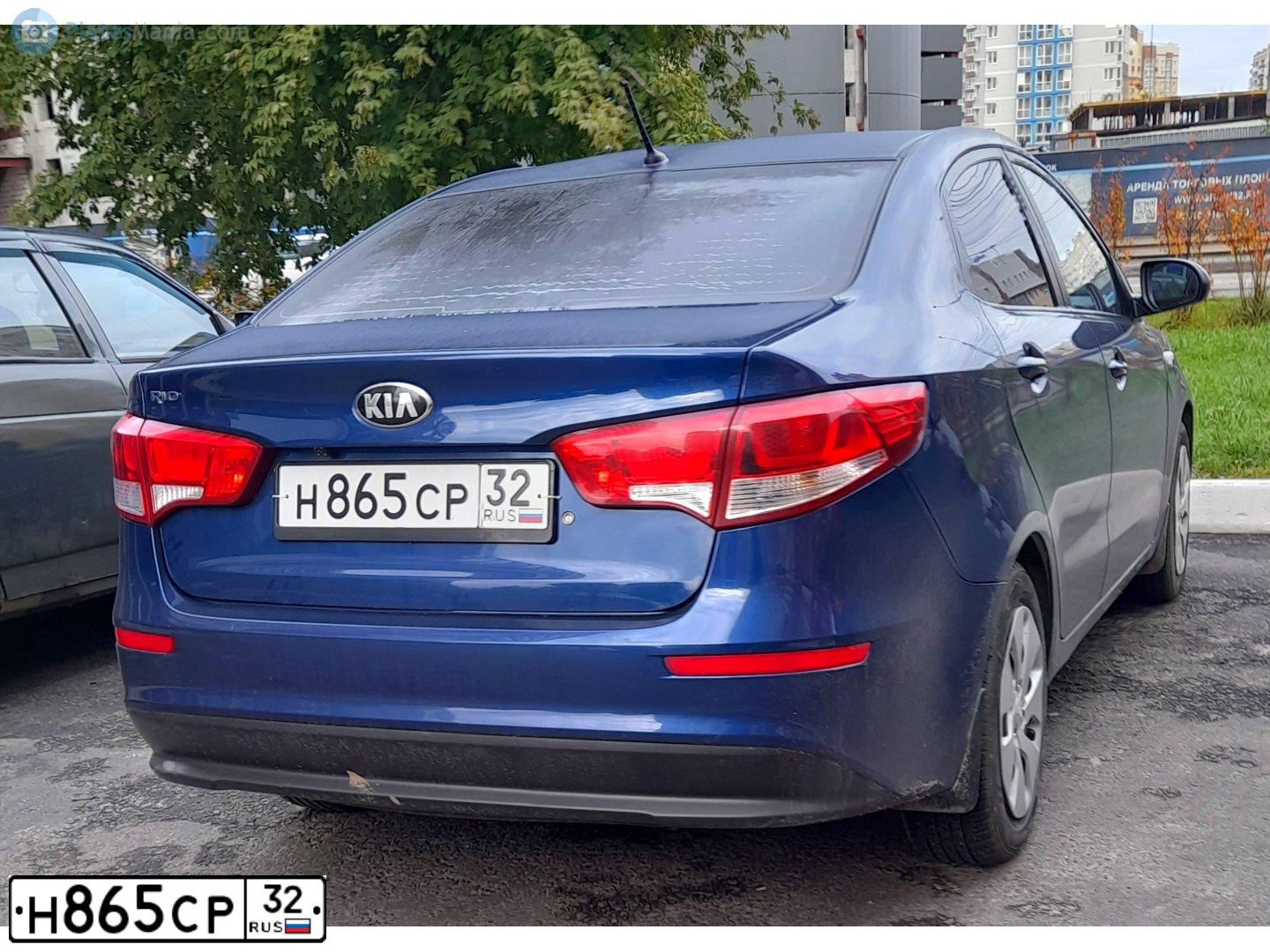 Фото автомобиля KIA RIO, 2015 — госномер Н103АТ32. Цвет: синий
