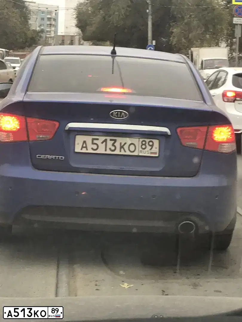 Фото автомобиля KIA CERATO, 2010 — госномер К586ЕХ164. Цвет: ГОЛУБОЙ