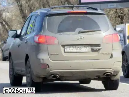 Фото автомобиля HYUNDAI SANTA FE, 2008 — госномер Е026ОН199. Цвет: ТЕМНО-СЕРЫЙ